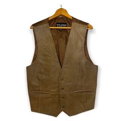 Wilsons Leather Vest Men's Sz L, 100% Leather Front, Nylon Back & Lining, Buckle In Back For Adjustable Fit, Pockets. Excellent Pre-Owned Like New Condition, Looks As Though Never Worn, Super Nice! Toffee Brown In Color. Measures: Armpit To Armpit 20.5", Length 26" At The Point In The Front. Classic Brown Vest For Outdoor, Classic Brown Outdoor Vest, Wilsons Leather Jacket, Vests Mens, Leather Vest, Leather Jackets, Toffee, Mens Jackets, Jackets & Coats