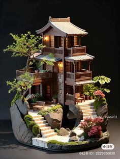 a model of a house with stairs and trees