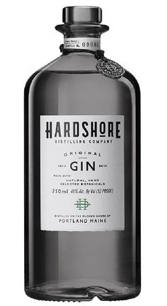 a bottle of gin on a white background with the words'hard shore'in it