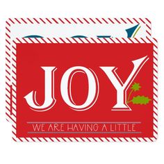 a red and white christmas card with the words, joy we're having a little