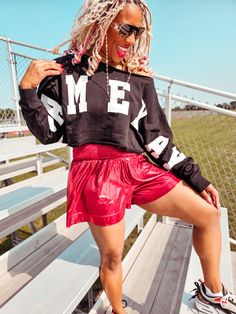 Get ready to rock the sidelines with Your Cheer Shorts! Show your team spirit in football season with their lightweight design and metallic red color. Whether you root for college or the NFL, these shorts will keep you looking and feeling fab with the smock waistband. Go Chiefs! Model: Riley, wearing size Small Paired with: It's Game Day Crop Sweatshirt Georgia Football Game Outfit, College Football Game Outfit Fall, Cute Football Outfits For Women, Go Chiefs, Cheer Shorts, Gameday Outfits, School Cheer, Game Outfit, Football Game Outfit