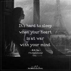 a woman sitting in front of a window with the words it's hard to sleep when