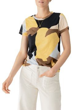 Jazz up your laid-back look with a cotton-first top covered in a groovy print. 24" length (size Medium) Crewneck Short sleeves 51% cotton, 49% rayon Machine wash, dry flat Imported Casual Abstract Print Tops For Fall, Casual T-shirt With Abstract Print, Trendy Relaxed Fit Multicolor Print Tops, Trendy Multicolor Print Tops With Relaxed Fit, Spring Cotton Tops With Abstract Print, Casual Multicolor Graphic Print Top, Casual Multicolor Tops With Retro Print, Crew Neck Cotton Tops With Abstract Print, Trendy Printed Cotton Tops