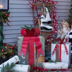 christmas decorations and presents are on display outside