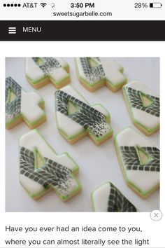 some cookies with green and white designs are on a table next to the words, have you ever had an idea come to you where you can almost see the light?