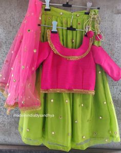 Product: Custom made girl kids dress. Fabric: Lehenga- net with foil mirrors Top -pink silk Dupatta - net embroidered Delivery Time : Please keep me informed for any dates or times frame you keeping in mind. Fitted Green Dress With Gota Work, Green Dori Work Dress For Festivals, Green Gota Work Party Dress, Green Dupatta With Dori Work, Green Art Silk Choli With Mirror Work, Green Choli With Gota Work For Diwali, Green Gota Work Choli For Diwali, Pista Green Self-design Lehenga For Festivals, Green Choli With Gota Work For Eid