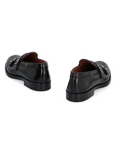 Step up your style game with these leather monk-strap shoes. They feature a lateral closure with a stylish metal buckle and a classic round toeline, making them the perfect choice for any upscale occasion. 100% calf leather for a luxurious feel Easy to slip on and off, perfect for busy days on the go Timeless design that pairs effortlessly with any outfit Monk Strap Shoes, Prada Designer, Strap Shoes, Balenciaga Designer, Monk Strap, Metal Buckles, Step Up, Leather Men, Leather Shoes