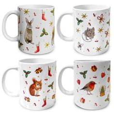 four coffee mugs with animals and christmas decorations on them, all decorated in white