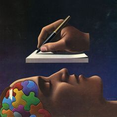 a person writing on top of a piece of paper next to a drawing of a woman's head