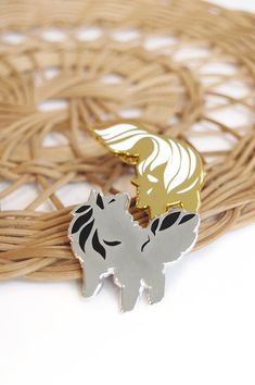 This is an enamel pin set of two wolves! There is a gold and white wolf, and a silver and black wolf. c: They are made to be a set, but you can buy single pins as well. Each pin is about 1.5 x 1.5 inches. Both pins have two fixtures on the back with metal clasps. Two fixtures means the pins won't spin around on your clothes. A lot of people ask me if these wolves are meant to be Hati and Skoll, which is a fine interpretation! c: Honestly I'm happy when a viewer looks at my work and applies their Luna And Artemis, Two Wolves, Gray Wolf, Dog Backpack, Mule Deer, Special Images, Embrace Change, White Wolf, Black Wolf