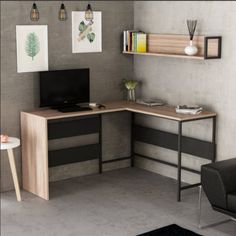 a corner desk with a computer on top of it in a room that has concrete walls