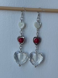 Adorable heart drop earrings. Perfect for valentine's day. Valentine's Day Clear Jewelry For Party, White Dangle Heart Earrings For Valentine's Day, Valentines Day Coquette, Heart Drop Earrings, Heart Earrings, Clear Glass, Jewelry Earrings Dangle, Valentine's Day, Dangle Drop Earrings