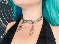 Back to the Basics: my Stainless Steel Chain Collection is an essential for every goth, punk, emo or metalhead's wardrobe. Stack it up, throw on some stompy boots, and you're all set to slay! 𝗣𝗿𝗼𝗱𝘂𝗰𝘁 𝗱𝗲𝘁𝗮𝗶𝗹𝘀: - 𝗖𝗼𝗹𝗼𝗿: stainless steel silver. - 𝗛𝗲𝗮𝘃𝘆 𝗗𝘂𝘁𝘆 𝗦𝘁𝗮𝗶𝗻𝗹𝗲𝘀𝘀 𝗦𝘁𝗲𝗲𝗹 𝗖𝗵𝗮𝗶𝗻: this piece of jewelry is not going to crap out on you. - 𝗔𝗱𝗷𝘂𝘀𝘁𝗮𝗯𝗹𝗲 𝗙𝗶𝘁: the stainless steel lobsters clasp offer adjustability allowing you to customize the fit Alternative Metal Choker For Concerts, Gothic Chain Choker For Concerts, Edgy Metal Choker For Cosplay, Alternative Metal Choker For Cosplay, Trendy Metal Jewelry For Cosplay, Edgy Choker With Adjustable Chain, Edgy Silver Choker For Cosplay, Alternative Style Silver Choker For Concert, Grunge Choker For Cosplay