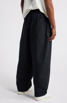 Volumize your look with these pleated and billowy balloon-leg pants that are made from cotton poplin and feature roomy pockets to further the theme. 28 1/2" inseam; 20" leg opening; 15 1/2" front rise; 18 1/2" back rise (size Medium) Elastic/drawstring waist with button closure Faux fly Side-seam pockets; back button-patch pockets 100% cotton Machine wash, tumble dry Imported Cotton Harem Pants With Elastic Cuffs, Spring Utility Style Relaxed Fit Harem Pants, Baggy Cotton Cargo Pants With Elastic Cuffs, Utility Cotton Pants With Elastic Cuffs, Baggy Cotton Utility Harem Pants, Spring Cotton Cargo Pants With Elastic Cuffs, Relaxed Fit Cotton Harem Pants With Elastic Cuffs, Cotton Relaxed Fit Harem Pants With Elastic Cuffs, Casual Nike Parachute Pants