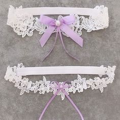 Introducing the Enchanted Lace White Leg Garter—the perfect blend of elegance and seduction for the modern woman. This floral lace leg garter is designed to add a delicate yet bold touch to your lingerie collection. Featuring intricate flower and leaf patterns, this women's garter wraps around your thigh with a romantic floral lace band, complete with a luxurious lilac ribbon and pearl accent. Whether you're slipping it on as a surprise detail beneath a dress or pairing it with your favorite bla Bride Party Dress, Colorful Lingerie, Bride Garter, Leg Garter, Teal Accents, Women Bride, Leaf Patterns, Lace Bands, Lace Garter