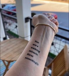 a woman's arm with a tattoo saying you are a walking must start according