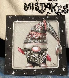 a card with an image of a clown wearing a hat on it's head