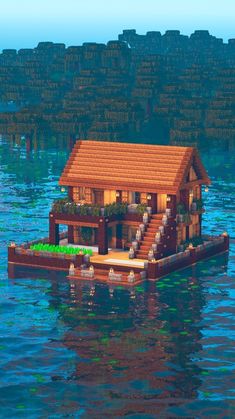 a house floating on top of water with stairs leading up to it's roof