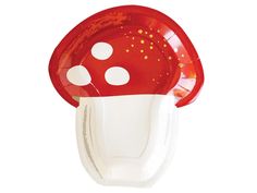 a red and white mushroom shaped plate with polka dots on it's rim, against a white background