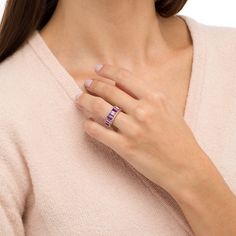 Display your clever taste in style with this baguette-cut purple amethyst, pink quartz and white lab-created sapphire border ring in rose gold over silver. Crafted in 18K rose gold over silver This look features 5.0 x 3.0mm baguette-cut gemstones - including dark and light purple amethyst, as well as soft-pink quartz - glistening in an alternating design. Ribbons of white lab-created sapphires border the center in shimmer. Luxury Purple Baguette Cut Jewelry, Purple Amethyst Rings With Baguette Cut, Purple Gemstone Rings With Baguette Cut, Purple Amethyst Baguette Cut Ring, Purple Gemstone Baguette Cut Rings, Purple Amethyst Baguette Cut Ring For Gift, Baguette Cut Amethyst Ring In Purple, Purple Baguette Cut Gemstone Rings, Purple Baguette Cut Amethyst Ring Gift