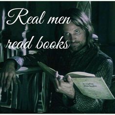 a man sitting in a chair holding a book and writing on it with the words real men read books