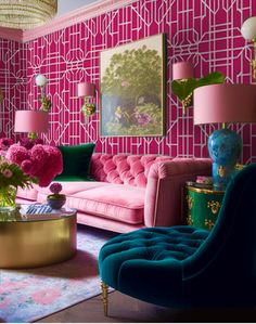 a living room filled with furniture and pink walls