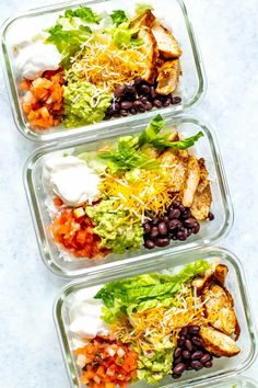 three plastic containers filled with different types of food