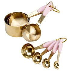 pink and gold measuring spoons and measuring cups with matching utensils on white background