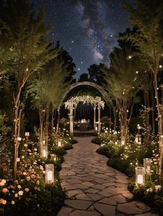 an outdoor wedding venue lit up at night with the stars in the sky above it