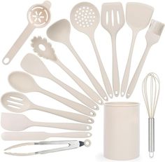 the kitchen utensils are arranged in a variety of shapes and sizes, including measuring spoons