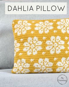 a crocheted pillow with the words dahla pillow written in white on it