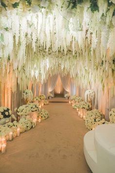 Floral wedding entrance with cascading white blooms and candles. Wedding Venues Indoor Elegant, Floral Tunnel, Wedding Venue Decor, Lavish Wedding, Dramatic Entrance, Extravagant Wedding, All White Wedding, Wedding Entrance