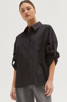 Evie Tie Back Poplin Shirt 100% COTTON -Button front placket -Poplin shirt -Tie back detail -Wide cuffed sleeve hem Model height is 5'9" wearing a small size S Poplin Button-up Shirt With Buttons, Fall Poplin Button-up Shirt, Relaxed Fit Poplin Tops With Button Cuffs, Chic Poplin Button-up Shirt, Poplin Blouse With Cuffed Sleeves For Work, Poplin Tops With Cuffed Sleeves For Workwear, Casual Poplin Tops With Button Cuffs, Fall Poplin Button-up Tops, Workwear Poplin Blouse With Cuffed Sleeves