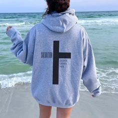 "Faith-Inspired Jesus Loves You Hoodie - a warm and comforting addition to your wardrobe that beautifully combines faith and style. This cozy sweatshirt bears the heartwarming message, \"Jesus Loves You,\" serving as a powerful reminder of the boundless love that Jesus has for you and all who believe in Him. In addition to this inspiring message, the hoodie features a Christian cross, symbolizing the ultimate sacrifice and salvation that Jesus brought to the world.  This Christian hoodie is perf Jesus Loves You Shirts, Love Like Jesus Shirt, Jesus Sweaters, Cute Hoodie Designs, Christian Sweatshirt Designs, Jesus Hoodies, Jesus Sweater, Loves You