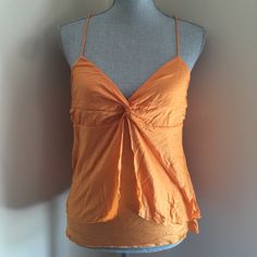 Orange Top Very Cute For Summer... Never Worn Sz Large Fitted Orange Camisole For Summer, Summer Orange Cami Tank Top, Orange Cami Tank Top For Summer, Spring Orange Camisole Casual Style, Orange Sleeveless Camisole For Spring, Chic Orange Tank Top For Summer, Brunch Cami Top With Knotted Straps, Fitted Orange Camisole Casual Style, Fitted Orange Casual Camisole