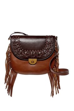 Details Finesse your look to include this charming Emi Fringe Large Saddle Bag. Made of leather with woven and fringe detail. Flap with push lock closure. Adjustable crossbody strap. Flat bottom. Lining made of polyester. Interior slip pocket. Foldover top with press lock closure Exterior features woven flap detail, back slip pocket, and fringe trim detail Interior features 1 slip and 1 zip pocket ImportedMaterialsLeather exterior, fabric lining Measurements: Bottom Width: 9 1⁄2 in Middle Width: Leather Saddle Bags, Brown Crossbody, Fossil Bags, Saddle Bag, Fringe Trim, Trim Detail, Crossbody Strap, Saddle Bags, Leather Crossbody