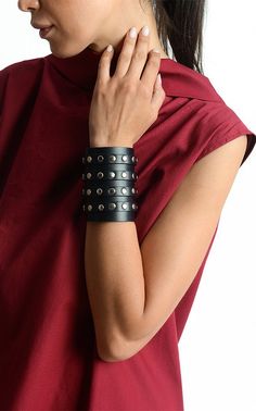 Studded Leather Cuff - METBR21 A modern leather long bracelet with many accents that make it a unique piece. The cuff is studded for a more interesting look and also has four decorative straps that go all over it. It goes with many outfits making them look better so do not wait - get it now! The size of the item is about 8 inches / 20 cm to 3.5 inches / 9 cm . It closes with all four straps that have a belt finish. NOTE! Since every piece is entirely handmade no two items are exactly the same wh Leather Pendant, Genuine Leather Bracelet, Hand Accessories, Black Leather Bracelet, Leather Wristbands, Heart Choker, Leather Bracelets, Leather Projects, Leather Work