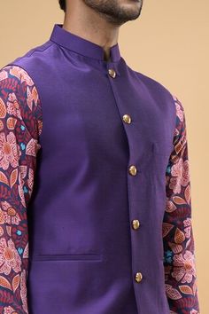 Purplish blue sleeveless solid bundi crafted in cotton silk. Paired with a gul print kurta and a white pant. - Aza Fashions Cotton Sleeveless Nehru Jacket For Festive Occasions, Fitted Cotton Nehru Jacket For Festivals, Festive Cotton Sleeveless Nehru Jacket, Festive Sleeveless Cotton Nehru Jacket, Transitional Sleeveless Cotton Kurta, Sleeveless Cotton Kurta, Fitted Sleeveless Nehru Jacket For Festivals, Kurta Set Men, Jayanti Reddy