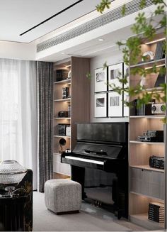 a living room filled with furniture and a piano