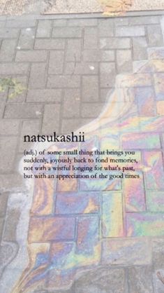 the sidewalk is covered in colorful chalk and has words written on it that read, matsukashi