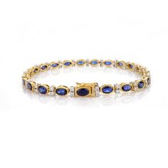 This is part of Chairish’s Fine Jewelry assortment.  This 6.91 CTW Natural Blue Sapphire Diamond Wedding Tennis Bracelet in 18K gold showcases endlessly sparkling natural blue sapphire of 6.91 carats and 0.97 carats diamonds. It measures 7.25 inches long in length.  Sapphire stimulates concentration and reduces stress.  Designed with perfect oval cut blue sapphire set with a diamond to make you stand out on any occasion or event. The elegant style complements the attire beautifully and is a perf Luxury Sapphire Tennis Bracelet With Brilliant Cut, Luxury Sapphire Tennis Bracelet With Diamond Accents, Elegant Sapphire Bracelets With Brilliant Cut, Elegant Sapphire Bracelet With Brilliant Cut, Classic Sapphire Diamond Bracelet With Brilliant Cut, Blue Diamond Bracelet With Brilliant Cut Luxury Style, Elegant Sapphire Tennis Bracelet With Brilliant Cut, Luxury Sapphire Cubic Zirconia Diamond Bracelet, Luxury Sapphire Diamond Bracelet With Gemstones