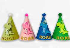 three party hats with the words roar roar written on them