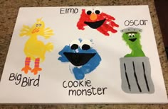 handprinted pictures of sesame the monster, oscar and cookie monster with words written on them