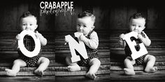 three baby boys sitting on the floor holding up letters that spell out no, crabdale photography