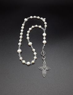 Elegant White Cross Rosary, Spiritual White Necklace For First Communion, White Spiritual Necklace For First Communion, White Crucifix Necklace For Baptism, White Pearl Spiritual Rosary, Spiritual White Pearl Rosary, White Cross Rosary For Jewelry Making, White Crucifix Jewelry With 8mm Beads, Rosary Necklaces