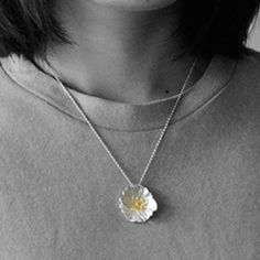 Material: 925 Sterling Silver, Gold PlatedSize: 2.5cm by 25cmDesign: Silver Handmade Poppy Flower Pendant (Necklace Not Included)Color: Silver, Yellow GoldPart of Weybourne Pendant, Ring and Earrings SetTucson Necklace will go perfectly with this pendant Nickel Free Flower Shaped Necklace, Sterling Silver Flower Necklace With Clavicle Chain, Silver Minimalist Flower Necklace, Silver Sterling Flower Necklace With Clavicle Chain, Ring And Earrings Set, Sterling Silver Flower Necklace, Travel Inspired Jewelry, Pendant Ring, Flower Pendant Necklace