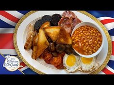 a plate with eggs, bacon, beans and toast on it in front of the british flag