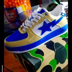 New With Box Bathing Ape Sta Low Yellow And Blue Top Sneakers. Size 11 Orange Bapesta Shoes, Designer Gold Low-top Custom Sneakers, Designer Gold Custom Low-top Sneakers, Designer Blue Low-top Sneakers, Designer Blue Lace-up Sneakers, Designer Blue High-top Custom Sneakers, Designer Blue Custom Sneakers With Round Toe, Designer Blue Low-top Custom Sneakers, Bapesta Shoes