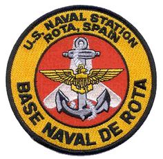 the u s naval station badge is shown