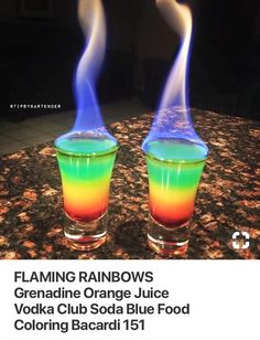 two blue and yellow vases with liquid pouring out of them on a granite countertop